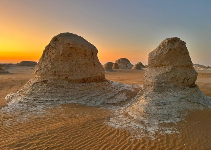 enjoying the scenery amidst the white rock formations during a guided tour of the White Desert